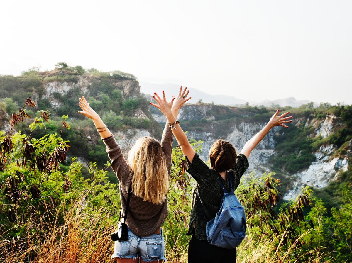 Woman at ease outdoors, calm and confident